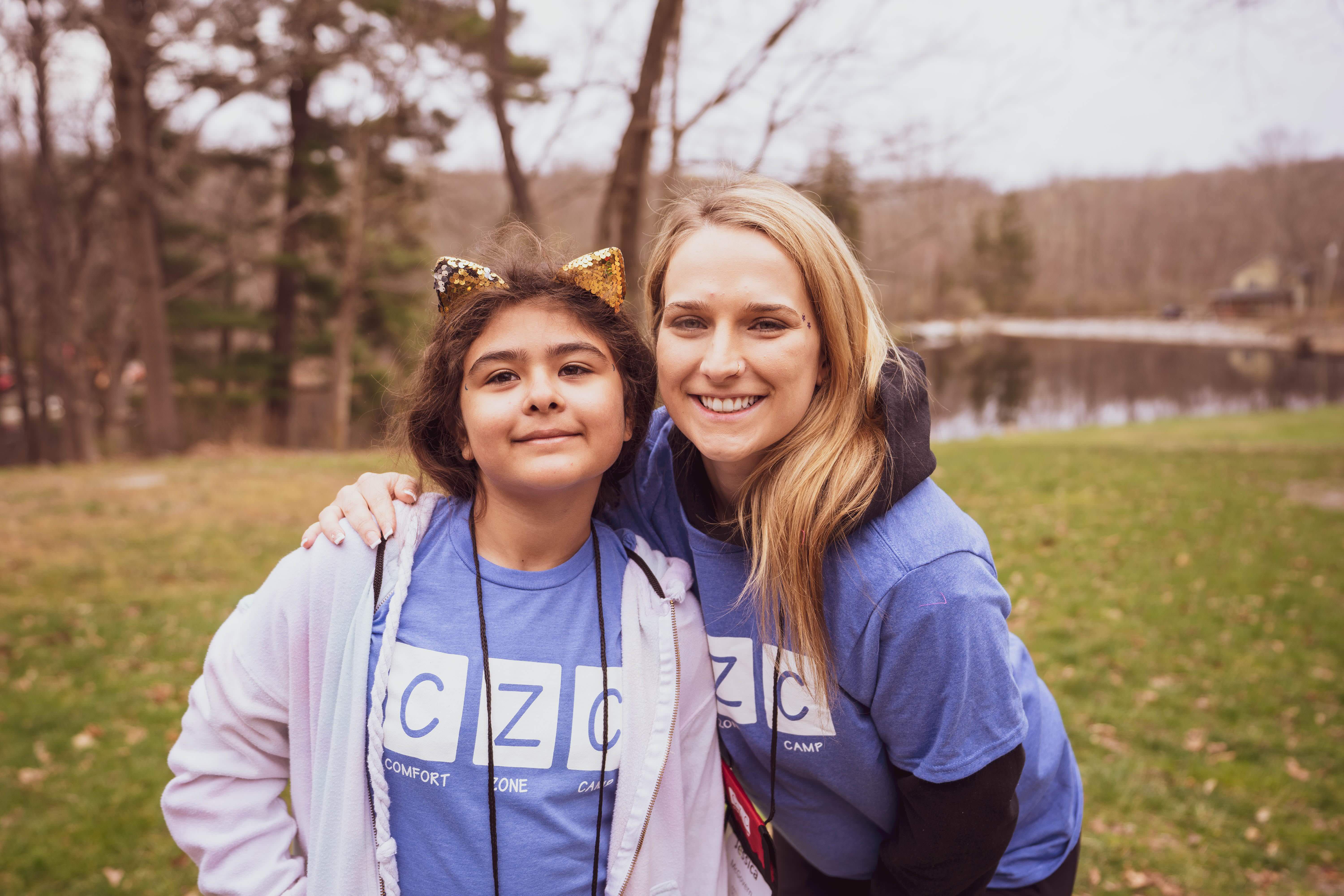Big Buddy volunteer Jessica and her Little Buddy Vicky exemplify the benefits of Comfort Zone Camp, which helps grieving kids find healing and community. Image courtesy of CZC