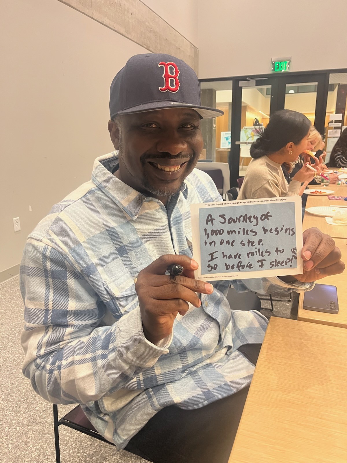 Tyshaun Perryman holds up two of his favorite sayings.